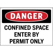 Danger sign warning of confined space entry by permit only.