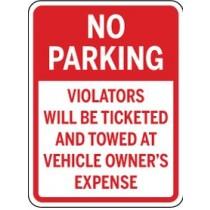 No parking sign with text about ticketing and towing.
