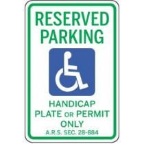 Handicap reserved parking sign with wheelchair icon and text.