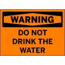 Orange warning sign with black text 'WARNING DO NOT DRINK THE WATER'