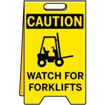 Caution sign warning of forklifts on a yellow background