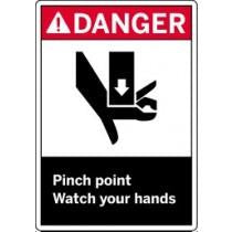 Safety sign warning about pinch points and advising to watch hands.