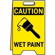 Caution sign for wet paint with a yellow background and black text.