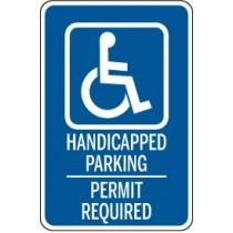 Handicapped parking permit required sign with wheelchair icon on a blue background