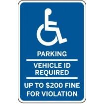 Handicap parking sign with text about vehicle ID requirement and fines.