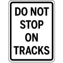 Traffic sign that says 'Do Not Stop on Tracks' on a white background