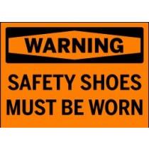 Warning sign with text 'Safety Shoes Must Be Worn' on an orange background