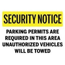 Security sign warning unauthorized vehicles will be towed