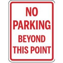 No parking beyond this point sign with red text on a white background