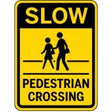 Yellow and black sign indicating 'Slow for Pedestrian Crossing'.