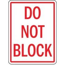 Sign with 'DO NOT BLOCK' text on a white background