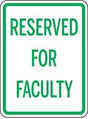 Sign with 'RESERVED FOR FACULTY' text on a white background