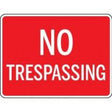 No Trespassing sign on a red background