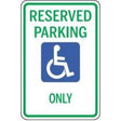 Handicap reserved parking sign with green border