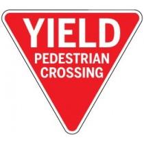 Yield Pedestrian Crossing sign with red background and white text