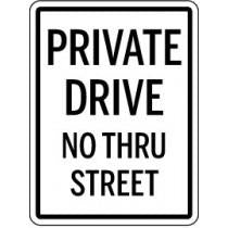 Sign indicating 'Private Drive No Thru Street' on a white background