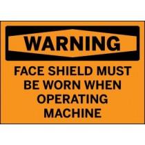 Warning sign with text 'Face shield must be worn when operating machine' on an orange background