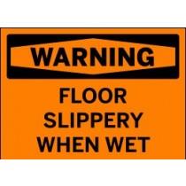 Warning sign indicating slippery floor when wet on an orange background
