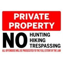 Private property sign with no hunting, hiking, or trespassing allowed.