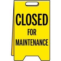 Yellow sign with 'Closed for Maintenance' text on a white background