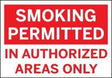 Red and white sign reading “Smoking Permitted in Authorized Areas Only”
