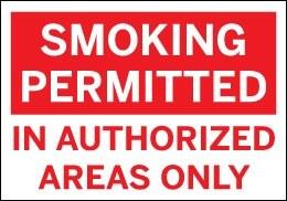 Red and white sign reading “Smoking Permitted in Authorized Areas Only”