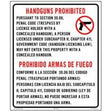 Sign prohibiting handguns on a property with bilingual text.