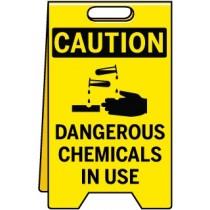 Caution sign indicating dangerous chemicals in use on a yellow background