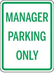 Sign with 'Manager Parking Only' text on a white background