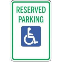 Handicap reserved parking sign with green border