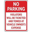 No parking sign with text about ticketing and towing.
