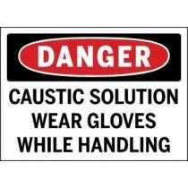 Safety sign warning about caustic solution and gloves usage