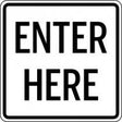 Sign with 'Enter Here' text on a white background