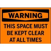 Warning sign with text 'This space must be kept clear at all times' on an orange background