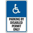 Handicap parking sign with text 'Parking by disabled permit only' on a blue background