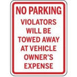 No parking sign with text about towing and owner's expense.