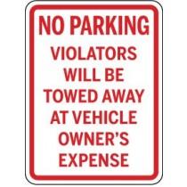 No parking sign with text about towing and owner's expense.