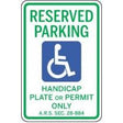 Handicap reserved parking sign with wheelchair icon and text.