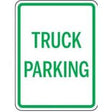 Sign indicating truck parking area with green text on a white background