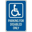 Blue and white sign with wheelchair icon and text 'Parking for disabled only' on a white background