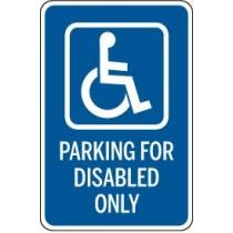 Blue and white sign with wheelchair icon and text 'Parking for disabled only' on a white background