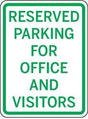 Reserved parking sign for office and visitors with green text on a white background