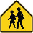 Yellow traffic sign with black silhouette of two people holding hands