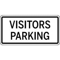 Sign with 'Visitors Parking' text on a white background