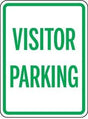 Visitor parking sign with green text on a white background