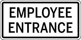 Sign with 'Employee Entrance' text on a white background