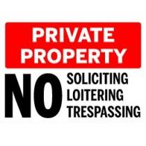 Private property sign with red border and black text on a white background