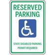 Handicap reserved parking sign with text and icon.