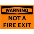 Warning sign with black text 'WARNING NOT A FIRE EXIT' on an orange background