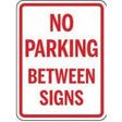 No parking between signs sign with red text on a white background